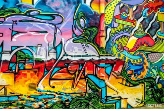 Bild på graffitis aux couleurs vives sur murs et gouttires